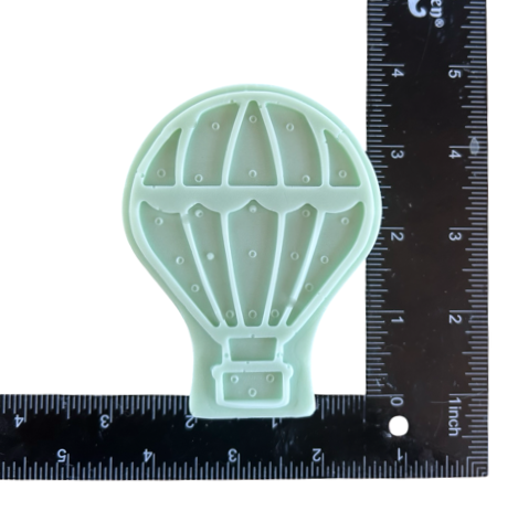Bar of soap with hot air balloon design by Plunk Soap Company, perfect for gifts, party favors, and travel-themed occasions.