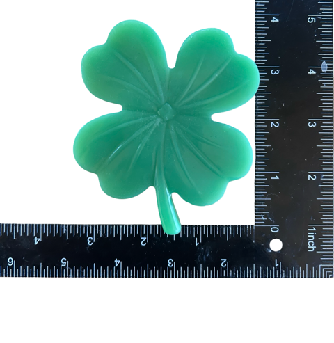 Four-leaf clover soap from Plunk Soap Company with a festive St. Patrick's Day design, perfect as party favors.